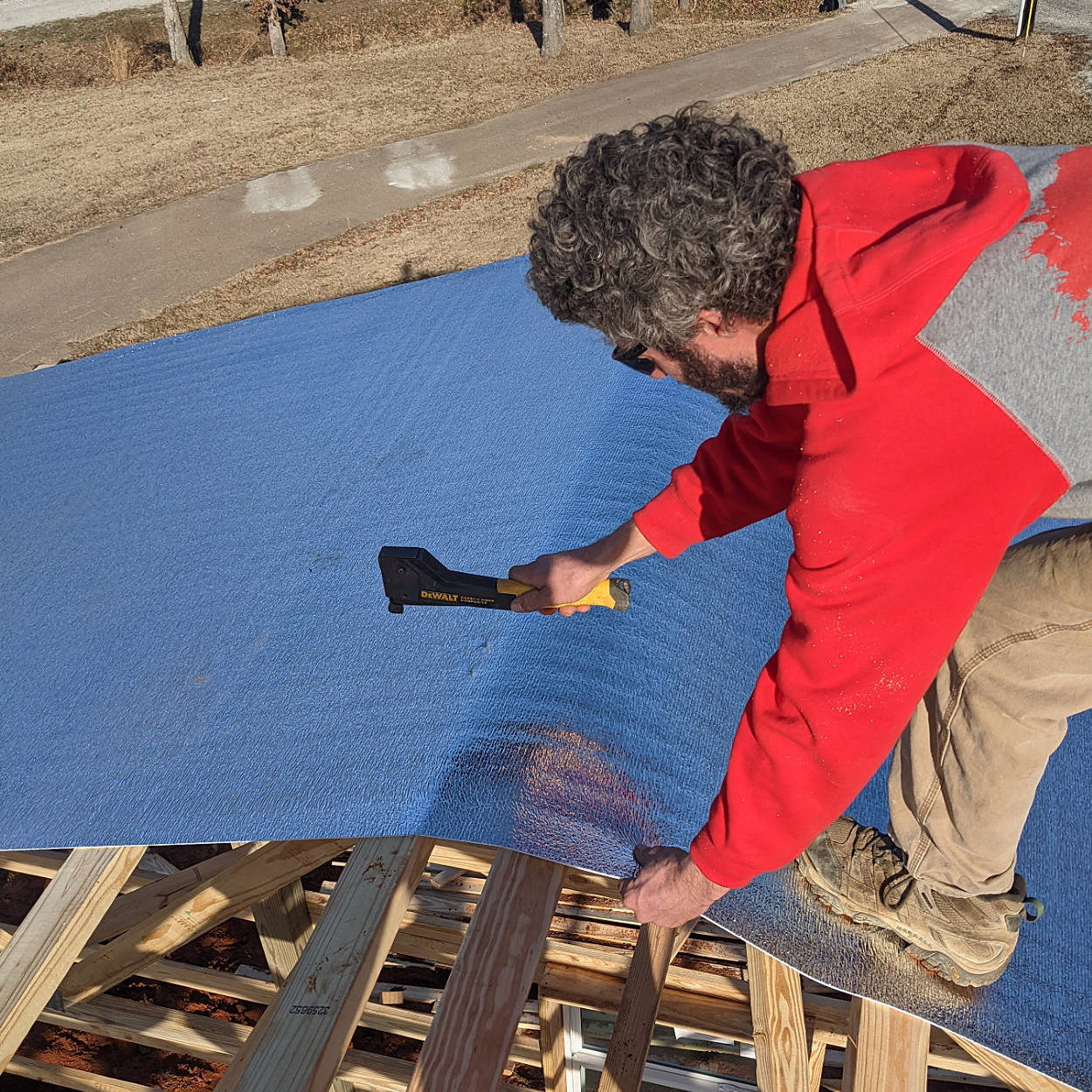 installing therma guard on roof of building